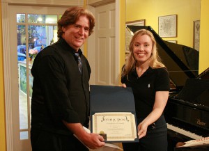 W.F. Lantry receiving his Honorable Mention from String Poet Founder and Editor Annabelle Moseley