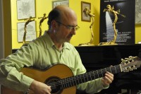 Harris Becker performs classical guitar at the String Poet Studio Series